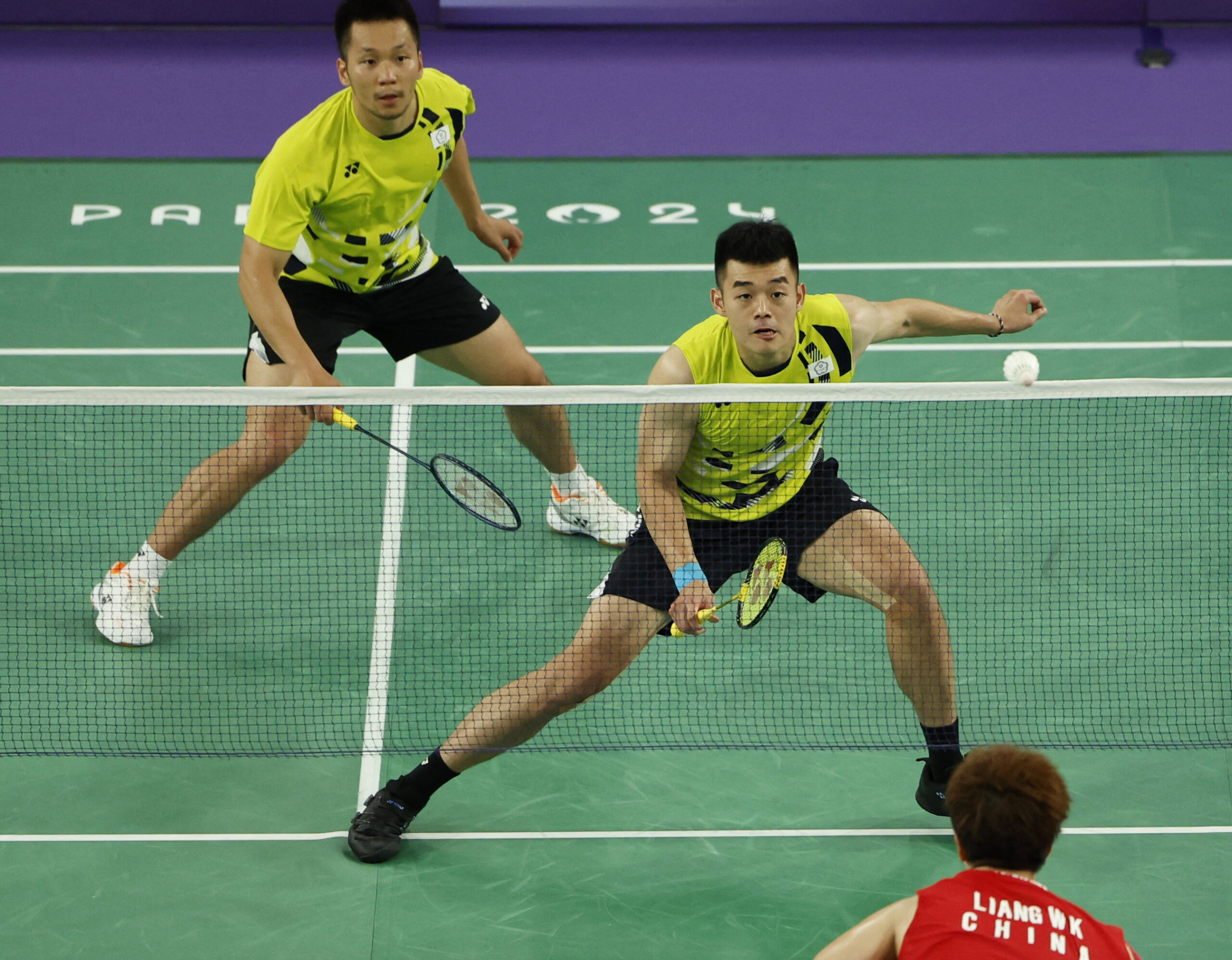 Wang Chi-Lin and Lee Yang Retain Olympic Badminton Title After Intense Battle